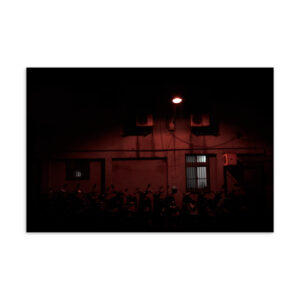 Row of parked scooters beneath a red street lamp on a dark Taipei street at night, original photography postcard print
