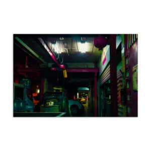 Taipei night market corridor lit by bare bulbs and neon green and magenta light, original photography postcard print
