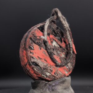 Handmade clay yorishiro spirit vessel, fissured red over charred black with rope loop